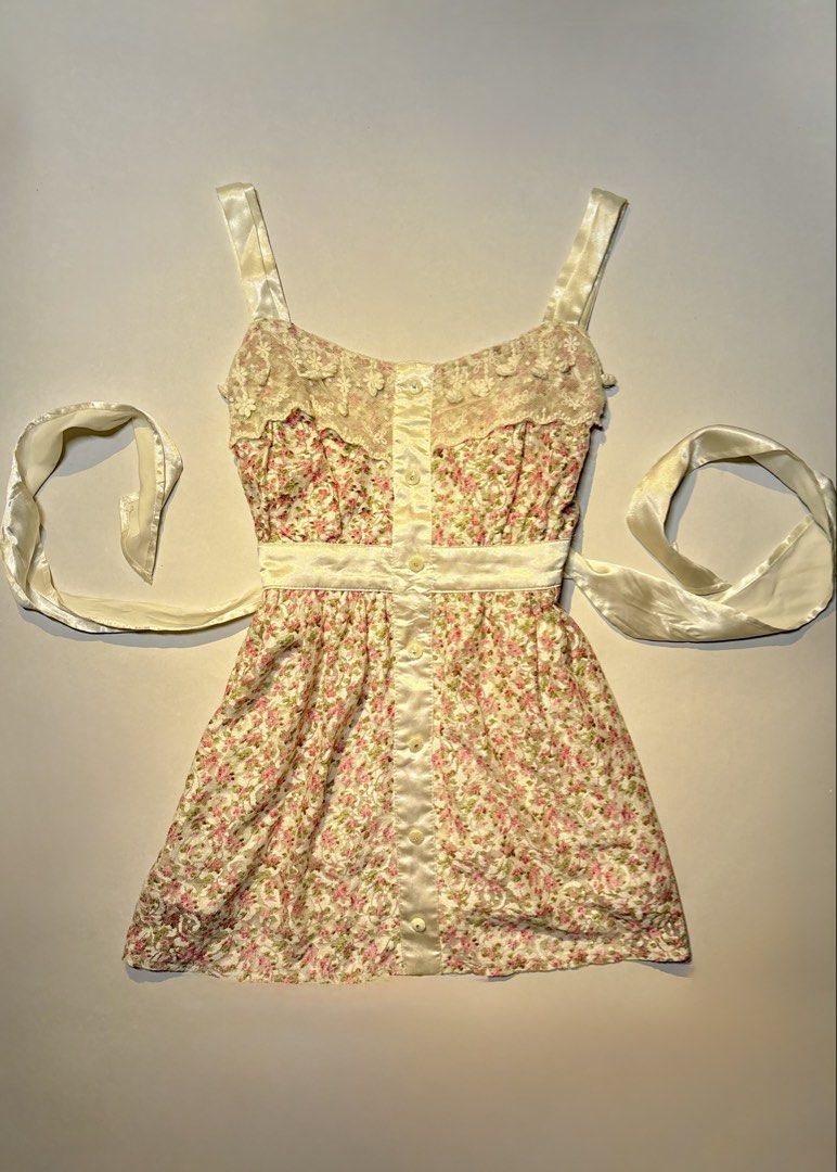 Pink Green Floral Button Down Blouse (Category: Blouses) located in Bacolod City. Submitted by thlnn_vls (Listing ID 1468884462, Image 2). Description: - Pink and green vintage-style button-down shirt - All-over floral print - Unique crinkle textured lightweight fabric - Long sleeves with a pointed collar - Perfect for effortless retro-chic looks.