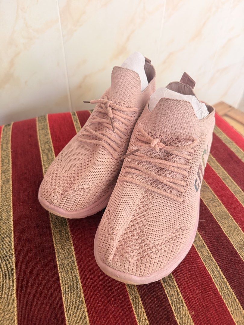 Pink Knit Slip-On Sneakers (Category: Sneakers) located in Manila. Submitted by sedpuprincess (Listing ID 1468783831, Image 1). Description: - Color: Pink with chic metallic side lettering - Design: Slip-on style with matching laces and a trendy chunky rose gold heel insert - Material: Lightweight and flexible knit upper for all-day comfort - Best For: Everyday walking and casual outfits - Condition: Carefully stored with paper stuffing inside to