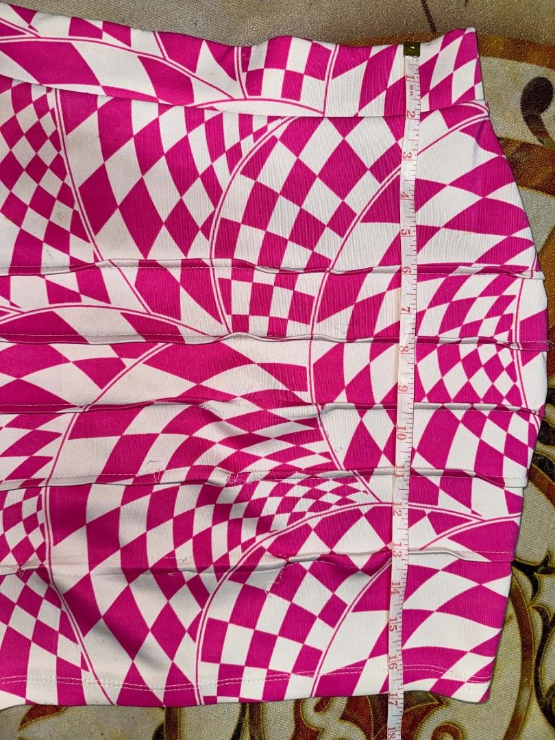 Pink White Checkerboard Print Ruched Mini Skirt (Category: Skirts) located in Caloocan City. Submitted by mylove326 (Listing ID 1468760687, Image 2). Description: - Pink and white psychedelic swirl checkerboard print - Flattering high-waisted fit with a structured waistband - Stylish horizontal ruching detail down the front - Stretchy, super comfortable fabric that's easy to style .
