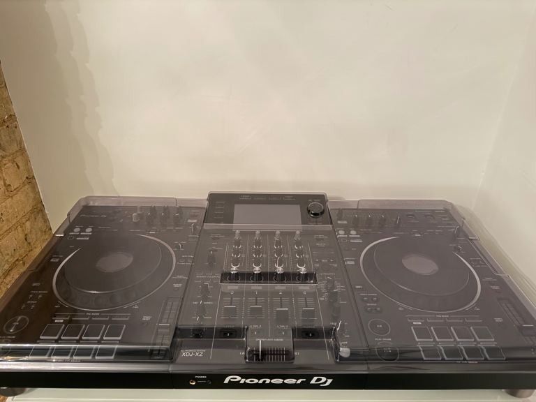 Pioneer XDJ-XZ All-in-One DJ Controller (Category: Soundbars, Speakers & Amplifiers) located in Manila. Submitted by wisecomoknapo (Listing ID 1468918960, Image 1). Description: - Model: Pioneer DJ XDJ-XZ 4-channel professional standalone system - Condition: Tested, 100% working, and well-maintained - Protection: Includes custom clear plastic covers for both decks and the main mixer section - Features: Dual jog wheels, central display screen, cle