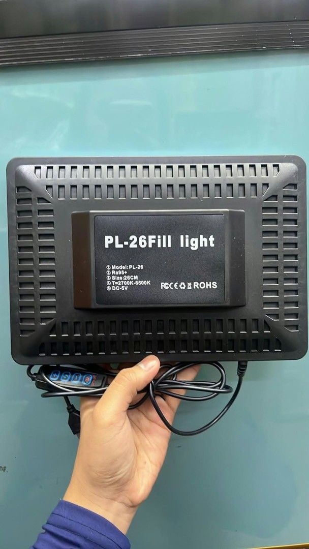 PL-26 LED Professional Photography Fill Light (Category: Lighting & Studio Equipment) located in Manila. Submitted by iliasjen3082126 (Listing ID 1468865961, Image 2). Description: - Model: PL-26 Professional LED Fill Light - Size: 26cm diameter - Color Temperature: Adjustable 2700K - 6500K - Color Accuracy: Ra95+ rating for vibrant, true-to-life colors - Power: DC 5V via attached inline controller and cable - Packaging: Includes original retail 