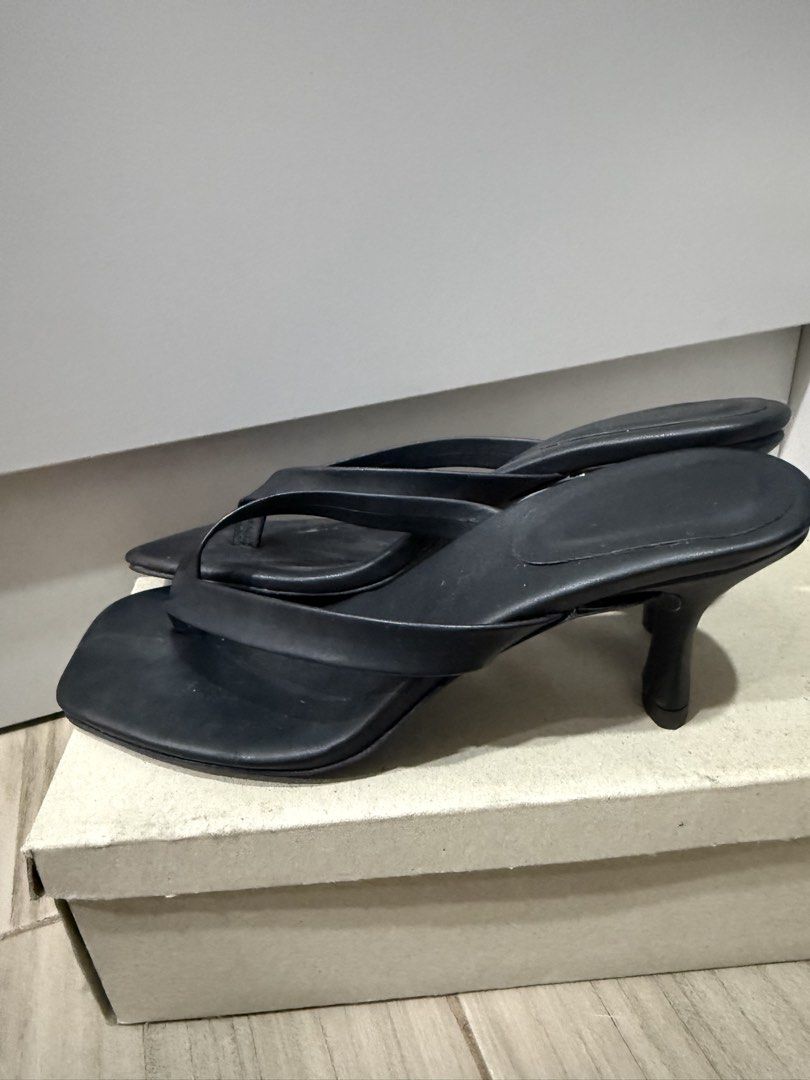 Plain Black Heels (Category: Heels) located in Quezon City. Submitted by mmbelarmino (Listing ID 1468740537, Image 3). Description: - Style: Minimalist black thong heels with trendy square toe - Heel: Comfortable kitten heel, perfect for everyday wear - Size 8 but can fit size 7.