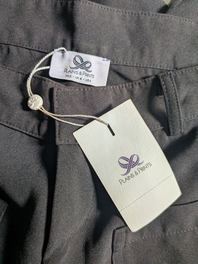 Plains & Prints Black Clustin Pants (Category: Jeans) located in Rizal. Submitted by yellowsandtea (Listing ID 1468762530, Image 2). Description: - Brand: Plains & Prints - Item: Black wide-leg pants - Size: PH S / UK 8 / US 4 - Condition: Brand new with tags attached, never worn - Details: High-waisted, front patch pockets, belt loops - Style: Versatile basic for work or casual days No issues. .