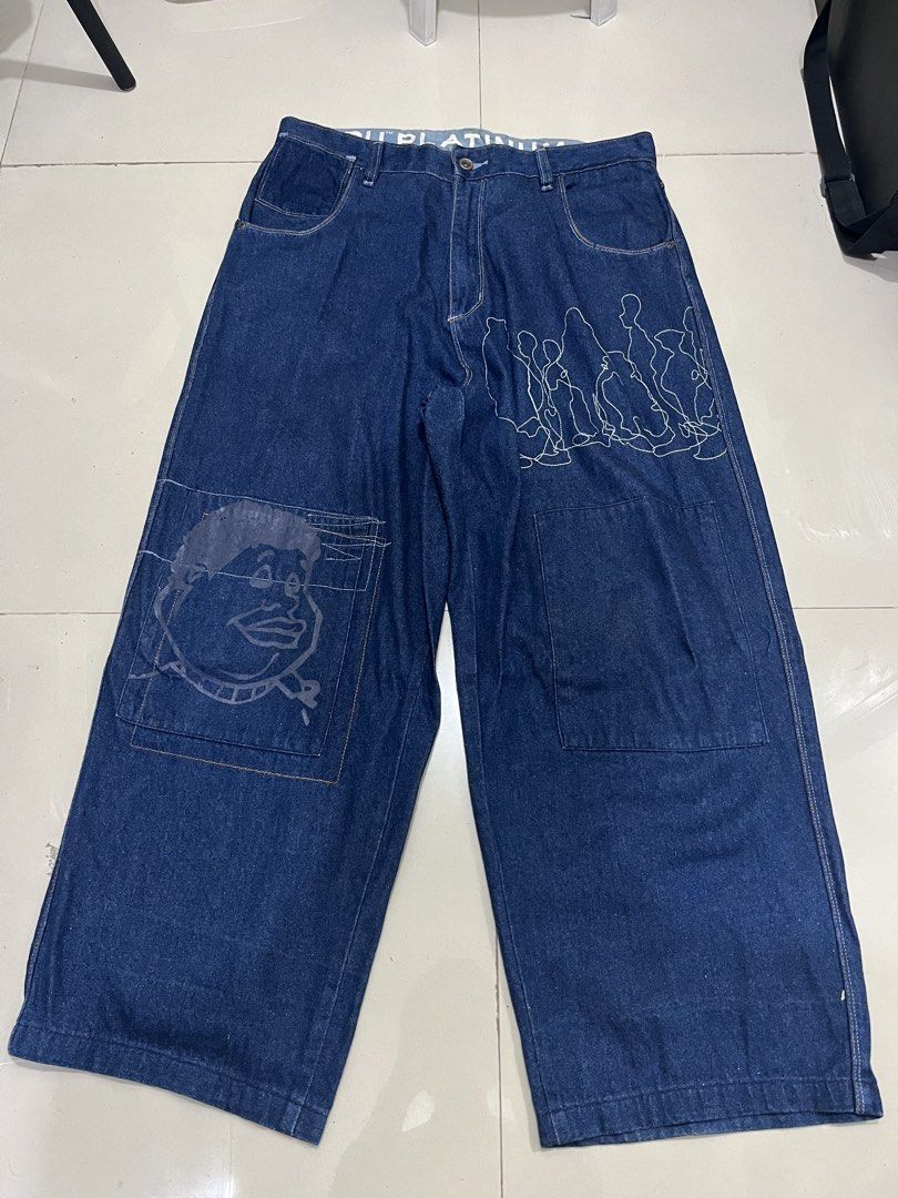Platinum FUBU Fat Albert RARE (Category: Jeans) located in Manila. Submitted by an0_na (Listing ID 1468890780, Image 1). Description: - Brand: Platinum FUBU - Style: Vintage dark wash wide leg, baggy fit denim jeans - Details: Fat Albert character graphic embroidery on back pocket and front leg - Interior: All-over printed inner lining with branded waistband - Size: Tagged W38 L34 (Measures approx. 19 inches across the waist laid flat).