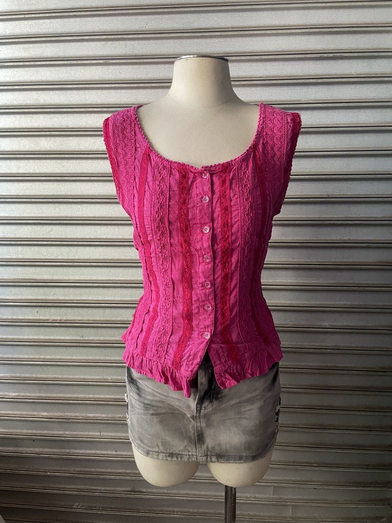 Platinum Pink Sleeveless Lace Trim Button Down Top (Category: Sleeveless) located in Davao. Submitted by riab_qt (Listing ID 1468776413, Image 1). Description: Bright pink sleeveless top from Platinum. Scoop neckline with a front button placket. Detailed with vertical panels of patterned lace running down the front and shoulders. Flounced ruffled hem at the waist. Fitted silhouette. Brand tag clearly visible on the inside collar. Great piece for 