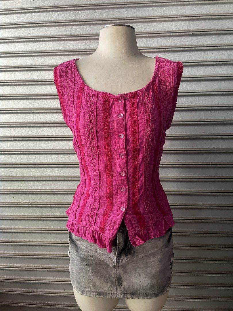 Platinum Pink Sleeveless Lace Trim Button Down Top (Category: Sleeveless) located in Davao. Submitted by riab_qt (Listing ID 1468776413, Image 2). Description: Bright pink sleeveless top from Platinum. Scoop neckline with a front button placket. Detailed with vertical panels of patterned lace running down the front and shoulders. Flounced ruffled hem at the waist. Fitted silhouette. Brand tag clearly visible on the inside collar. Great piece for 