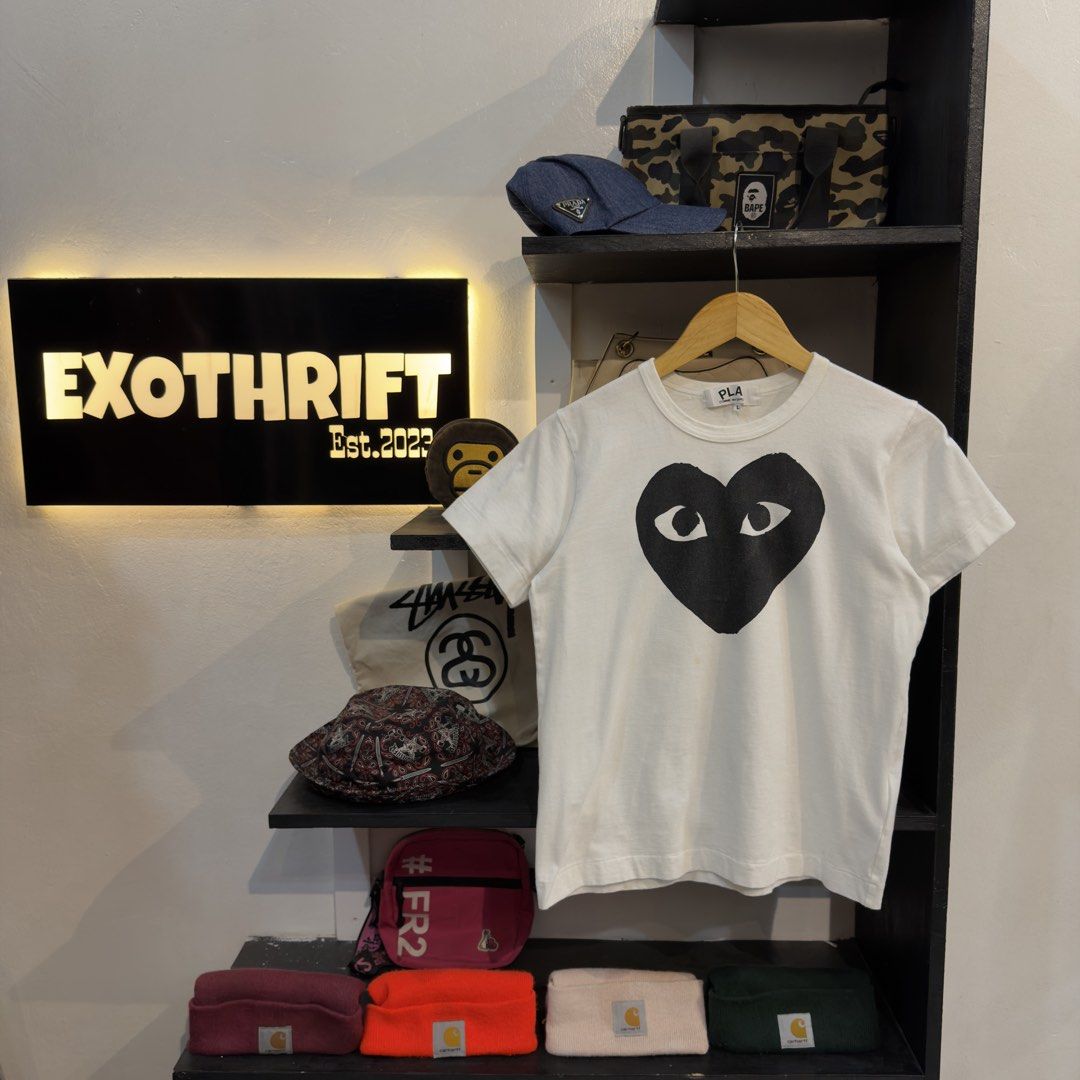 Play CDG White Shirt (Category: Shirts) located in Manila. Submitted by jerichomal82553 (Listing ID 1468875098, Image 1). Description: Play CDG White Black Heart Shirt 18.5 by 22 Good Condition Complete Tags CLAIM 1300.