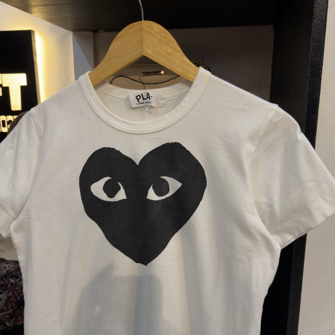 Play CDG White Shirt (Category: Shirts) located in Manila. Submitted by jerichomal82553 (Listing ID 1468875098, Image 2). Description: Play CDG White Black Heart Shirt 18.5 by 22 Good Condition Complete Tags CLAIM 1300.