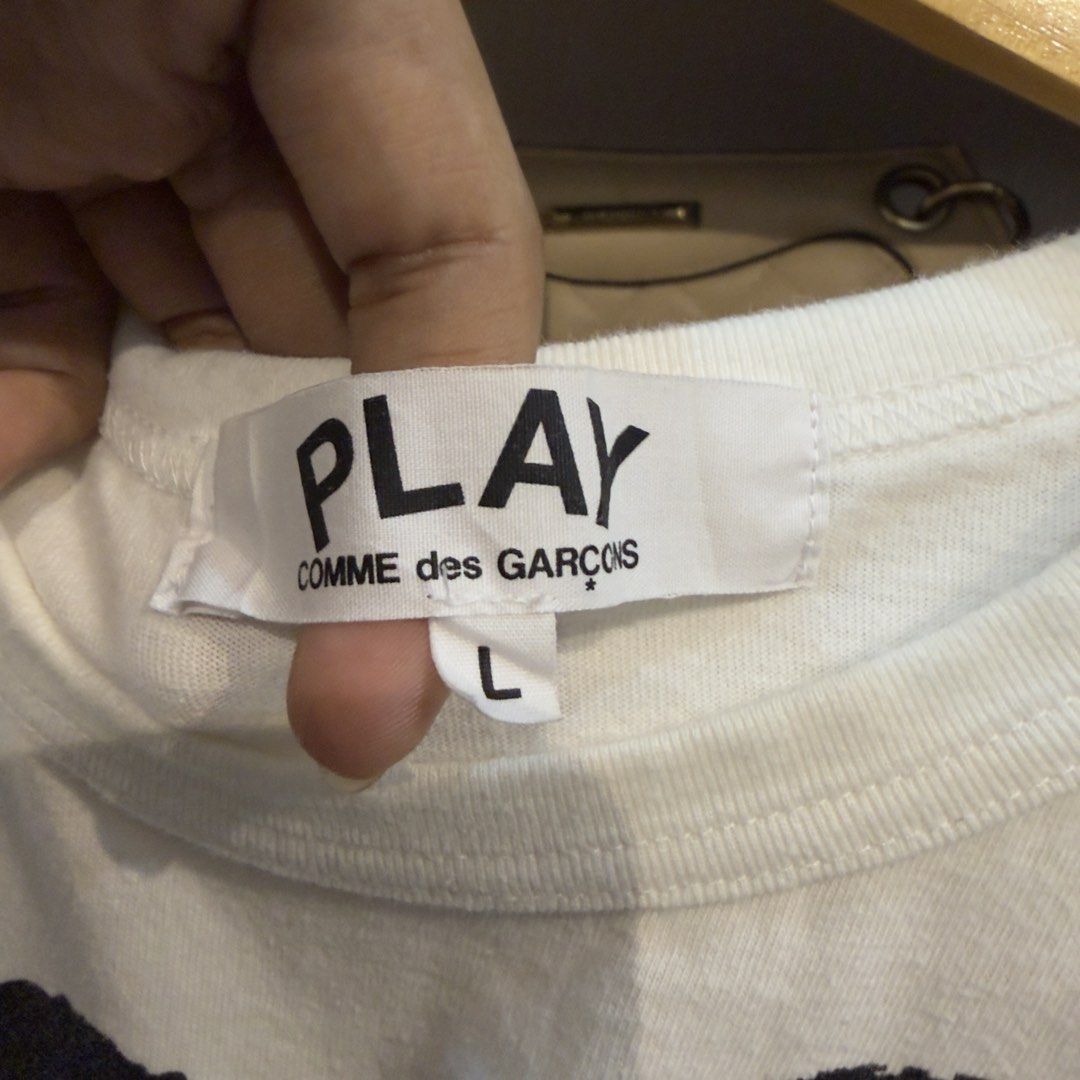 Play CDG White Shirt (Category: Shirts) located in Manila. Submitted by jerichomal82553 (Listing ID 1468875098, Image 3). Description: Play CDG White Black Heart Shirt 18.5 by 22 Good Condition Complete Tags CLAIM 1300.