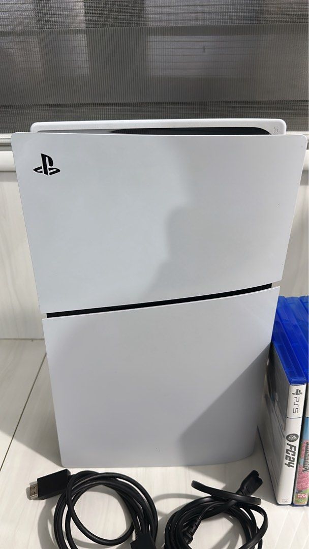 PLAYSTATION SLIM DISC VERSION (Category: Desktops) located in Laoag. Submitted by jewellesoriano (Listing ID 1468774768, Image 2). Description: For sale: Playstation 5 Slim Disc Version Storage: 1TB 2 original controllers Hdmi/Power Cable 4 Physical games -Grand Theft Auto V (GTA V) -Minecraft -Fifa 22 -Fc 24 No box. In very good condition, no issue presentable. Test all you want Price: 29k nalang rush 📍Laoag City, Ilocos Norte Open for COD/COP 