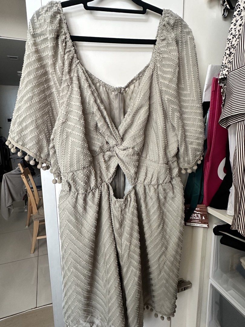 Plus size sage green Textured Pom Pom Romper (Category: Rompers) located in Caloocan City. Submitted by be.iiiii (Listing ID 1468830731, Image 1). Description: - Color: sage green - Pattern: Chevron texture throughout - Details: Half sleeves with cute pom pom trim, twist front with subtle bust cut-out - Closure: Back zipper - Fabric: Lightweight and breezy, perfect for warm weather or brunch - Measurements: Available upon request (send a message!