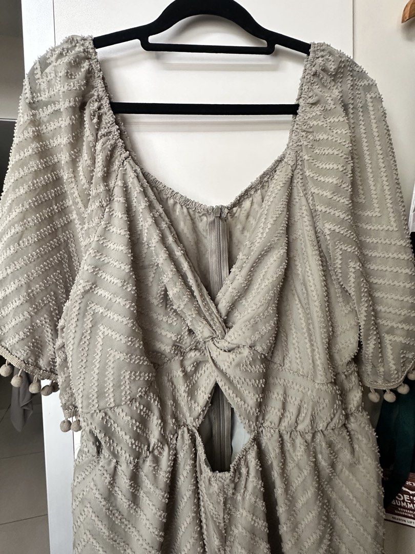 Plus size sage green Textured Pom Pom Romper (Category: Rompers) located in Caloocan City. Submitted by be.iiiii (Listing ID 1468830731, Image 2). Description: - Color: sage green - Pattern: Chevron texture throughout - Details: Half sleeves with cute pom pom trim, twist front with subtle bust cut-out - Closure: Back zipper - Fabric: Lightweight and breezy, perfect for warm weather or brunch - Measurements: Available upon request (send a message!