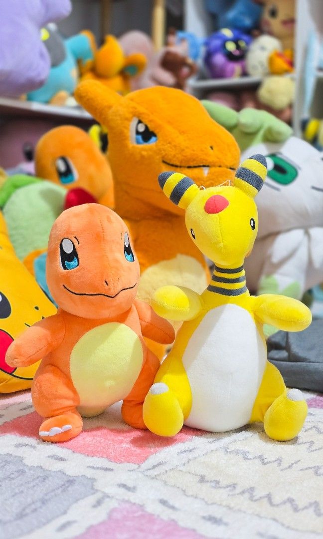 Pokémon Charmander and Ampharos Plushies [BUNDLE] (Category: Plushies & Soft Toys) located in Paranaque City. Submitted by vanchris84 (Listing ID 1468814172, Image 1). Description: - Set of 2 plush toys: Charmander and Ampharos - Charmander is 3rd Round; Ampharos is Banpresto - Made from soft material in bright orange and yellow - Great size for display or cuddling - Selling as a set.
