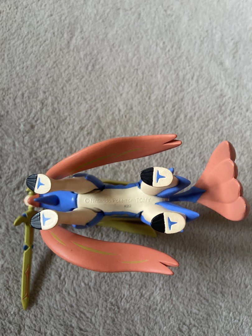 Pokémon Zacian Crowned Sword Tomy Figure (Category: Figurines & Statues) located in Davao. Submitted by mengsmixitems (Listing ID 1468715182, Image 3). Description: - Brand: Tomy (Official Nintendo stamp on underside) - Character: Zacian (Crowned Sword Form) - Colors: Blue and gold design - Condition: Stands well on display - Ideal for Pokémon collections.