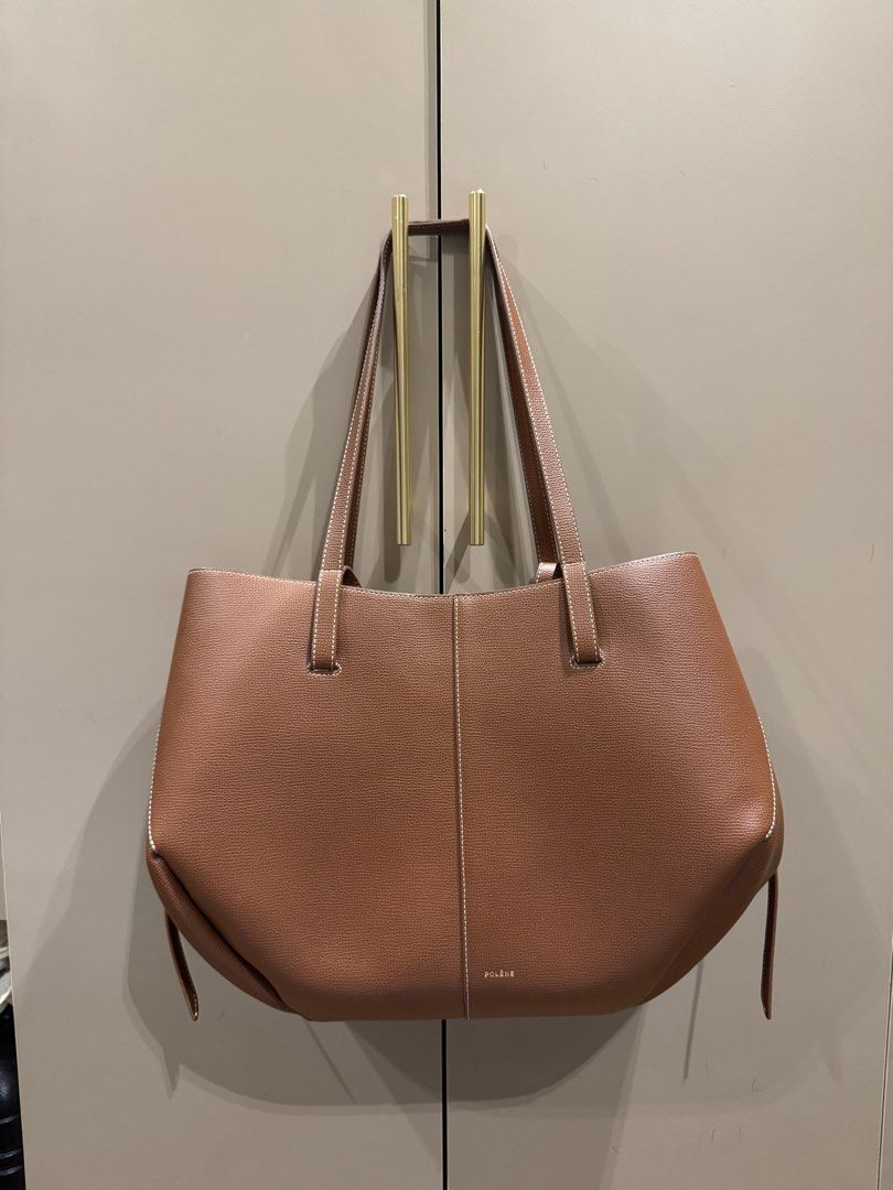 Polene Cyme Regular Cognac (Category: Luxury Bags & Wallets) located in Mandaluyong City. Submitted by bye.buy.bye (Listing ID 1468851812, Image 1). Description: Polene Cyme - regular size - cognac color - with free bag organizer - with box.