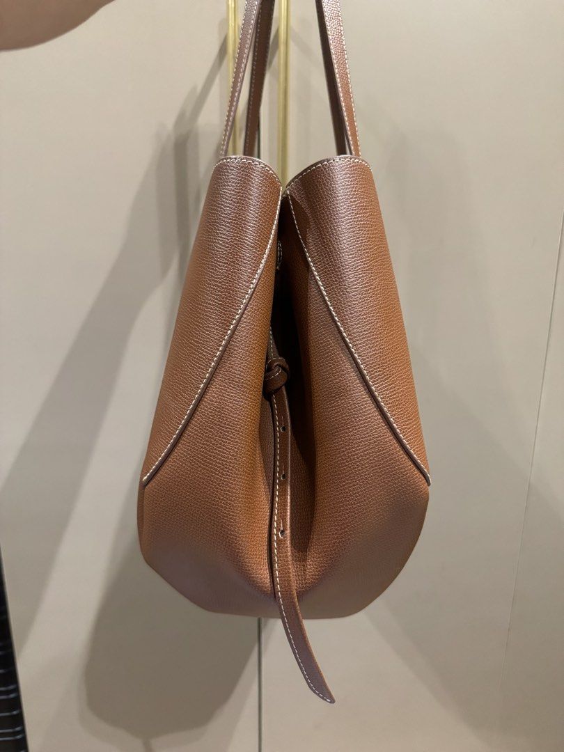 Polene Cyme Regular Cognac (Category: Luxury Bags & Wallets) located in Mandaluyong City. Submitted by bye.buy.bye (Listing ID 1468851812, Image 3). Description: Polene Cyme - regular size - cognac color - with free bag organizer - with box.
