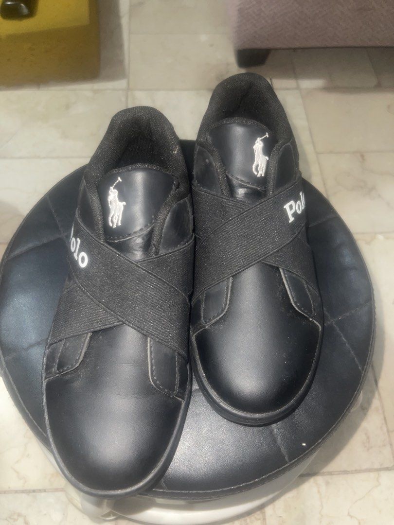 Polo Black Casual Sneakers with Elastic Straps (Category: Babies & Kids Fashion) located in Manila. Submitted by bbprelove1990 (Listing ID 1468853397, Image 2). Description: -Good as New -Kids Size 2 USA, 1 1/2 UK, EUR 32.5 - Unisex -Elegant to wear -Price is Negotiable - Shipping via Lalamove or Grab express Polo Ralph Lauren Oakview Slip On style sneakers, which typically retail between ₱3,500 and ₱5,500 PHP in the Philippines. Because this par