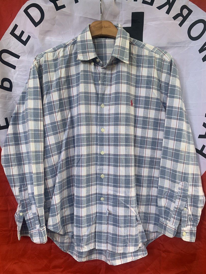Polo by Ralph Lauren Plaid Polo Button-Down (Category: Tshirts & Polo Shirts ) located in Angeles City. Submitted by kj772c_ (Listing ID 1468739411, Image 1). Description: - Brand: Polo by Ralph Lauren - Style: Long sleeve button-down shirt with classic collar - Design: Blue, white, and red plaid pattern with yellow accent lines - Details: Iconic red embroidered pony logo on the chest - Size: Tagged size 20 - Condition: Great classic casual piece