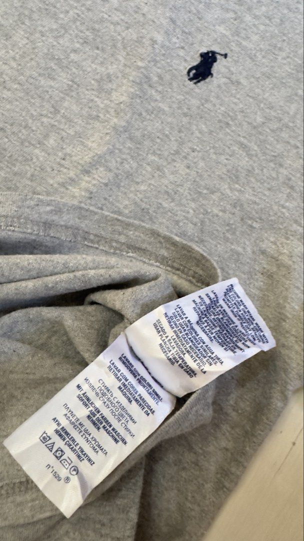 POLO RALPH LAUREN (Category: Tshirts & Polo Shirts ) located in Davao. Submitted by kelsocool (Listing ID 1468801600, Image 3). Description: Polo Ralph Lauren Grey Crewneck Tee Size: L Dimes (inch): 26 - length 18.5 - width 8.2 - sleeve color rate: 9/10 good condition issue - none Description: Minimalist Polo Ralph Lauren heather grey crewneck tee featuring subtle dark navy pony chest embroidery..