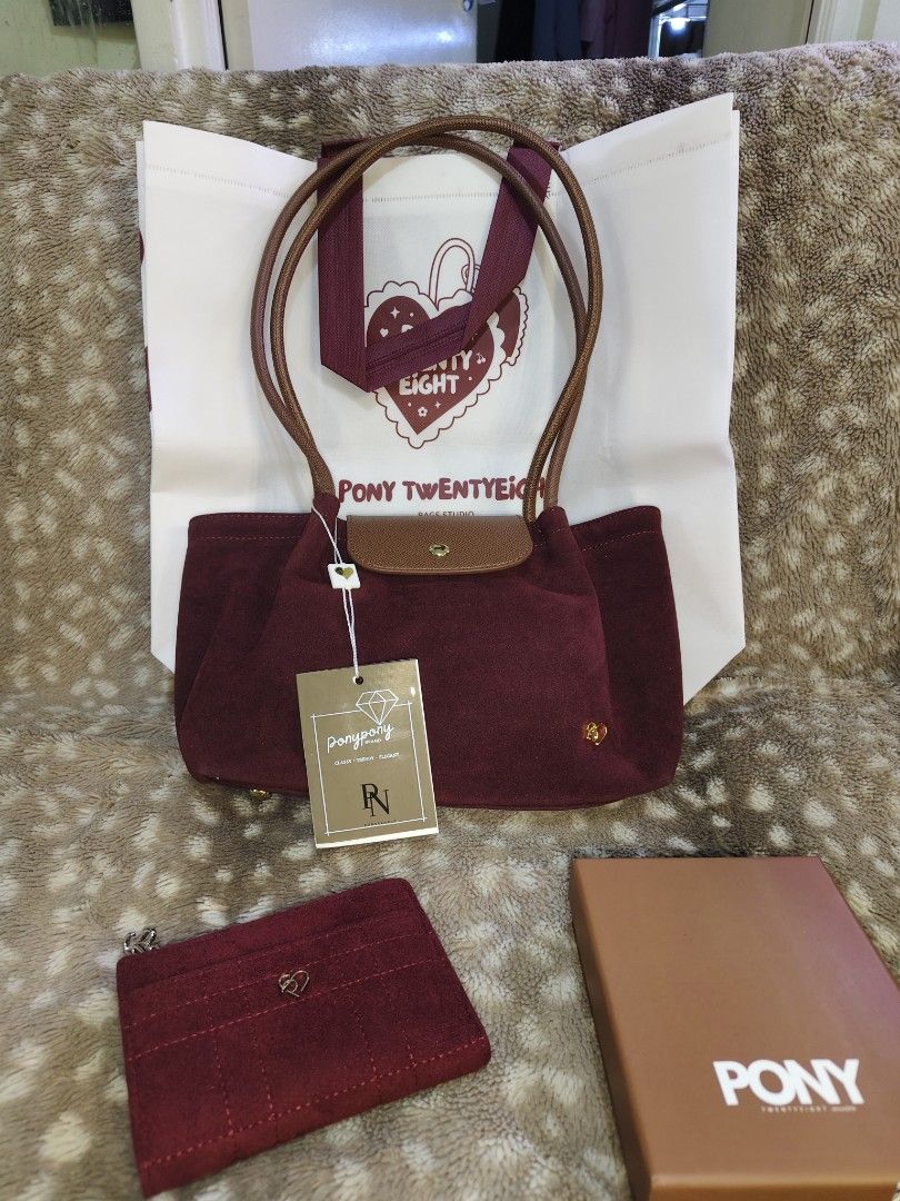Pony TwentyEight Suede Red Bag and Wallet (Category: Shoulder Bags) located in Caloocan City. Submitted by abbyyaotuazon (Listing ID 1468758632, Image 1). Description: .