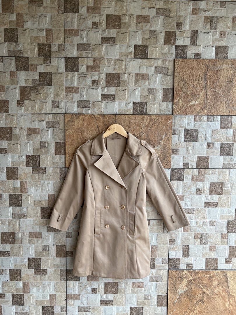 PRADA - DOUBLE BREASTED TRENCH COAT (Category: Coats, Jackets and Outerwear) located in Bacolod City. Submitted by timelessbyjosh (Listing ID 1468822565, Image 1). Description: BEST FOR COZY & COLD WEATHER OUTFITS SIZE : ACTUAL COLOR : TAN COLOR RATE : 9. 5 OUT OF 10 CONDITION : EXCELLENT MATERIAL : MADE IN : FLAWS : NONE DIMENSIONS LENGTH - 30 WIDTH ( ARMPIT TO ARMPIT )- 17. 5 WAIST - 38 MEASUREMENT TAKEN WHILE LAYING FLAT. PLEASE COMPARE THE ME