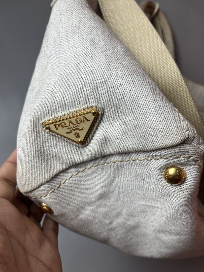 Prada Canapa 2 way bag (Category: Tote Bags) located in Quezon City. Submitted by theideal (Listing ID 1468888968, Image 2). Description: Read first before buy Legit/Authentic Prada canapa 2 way bag No box Still in good and presentable condition No major flaws Minor sign of use only See picture details posted.