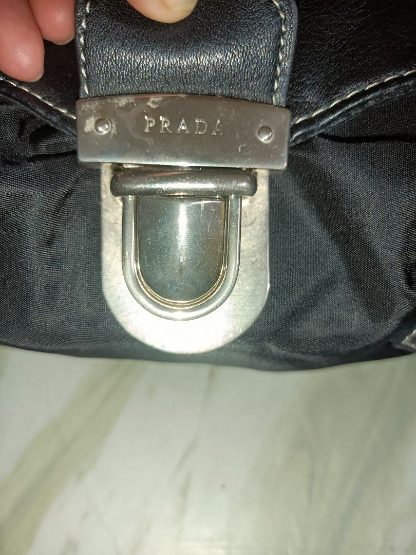 Prada Fold-over Shoulder Bag (Category: Shoulder Bags) located in Bolinao. Submitted by shayne_0215 (Listing ID 1468930153, Image 2). Description: - No Code and No Underzip, just Name Plate and hologram inside - No Flaws - Last Price Posted - Deal Now, Pay Now - MOP: GCASH - SF will be shouldered by the buyer.