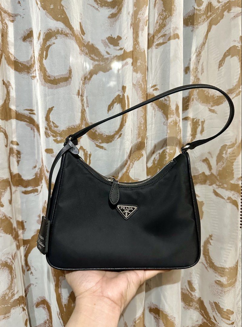 PRADA KILI BAG JAPAN PRELOVED (Category: Shoulder Bags) located in Manila. Submitted by tianasmom (Listing ID 1468915592, Image 1). Description: 🇯🇵JAPAN PRELOVED ✔️PLS SELF AUTHENTICATE 💯 NYLON CANVAS MATERIAL LAMPO ZIPPER WITH WHITE TAG MADE IN ITALY TAG WITH CARECARD .