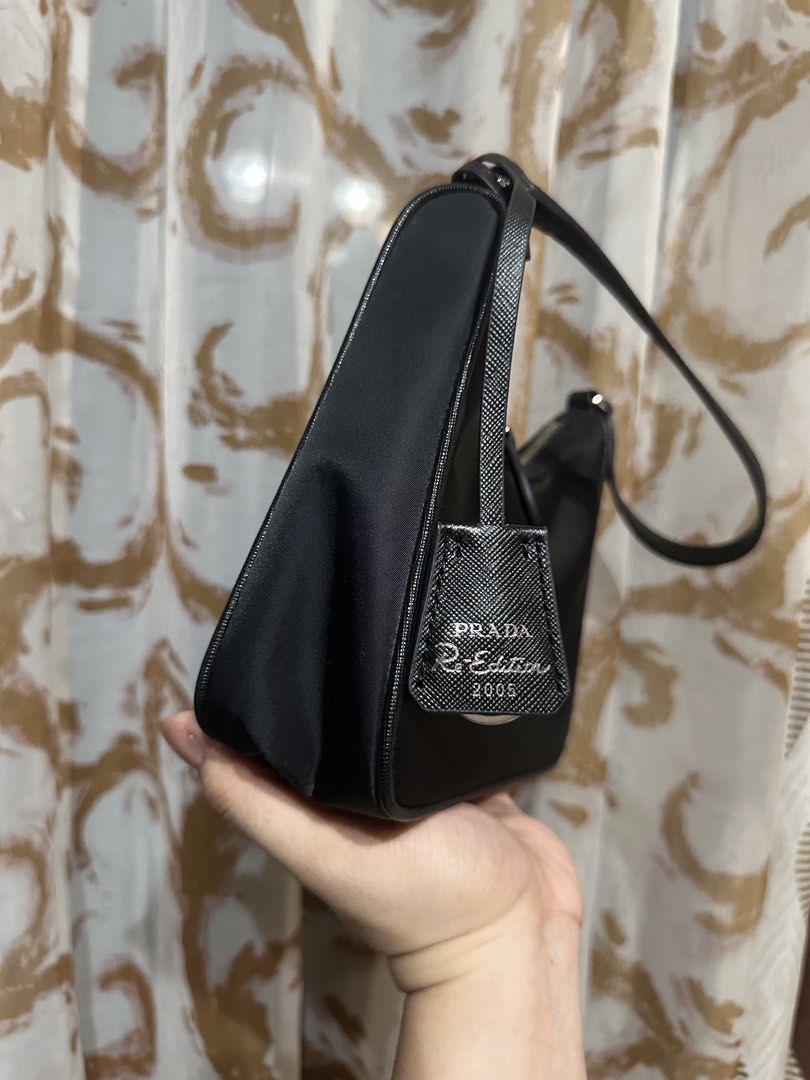 PRADA KILI BAG JAPAN PRELOVED (Category: Shoulder Bags) located in Manila. Submitted by tianasmom (Listing ID 1468915592, Image 2). Description: 🇯🇵JAPAN PRELOVED ✔️PLS SELF AUTHENTICATE 💯 NYLON CANVAS MATERIAL LAMPO ZIPPER WITH WHITE TAG MADE IN ITALY TAG WITH CARECARD .