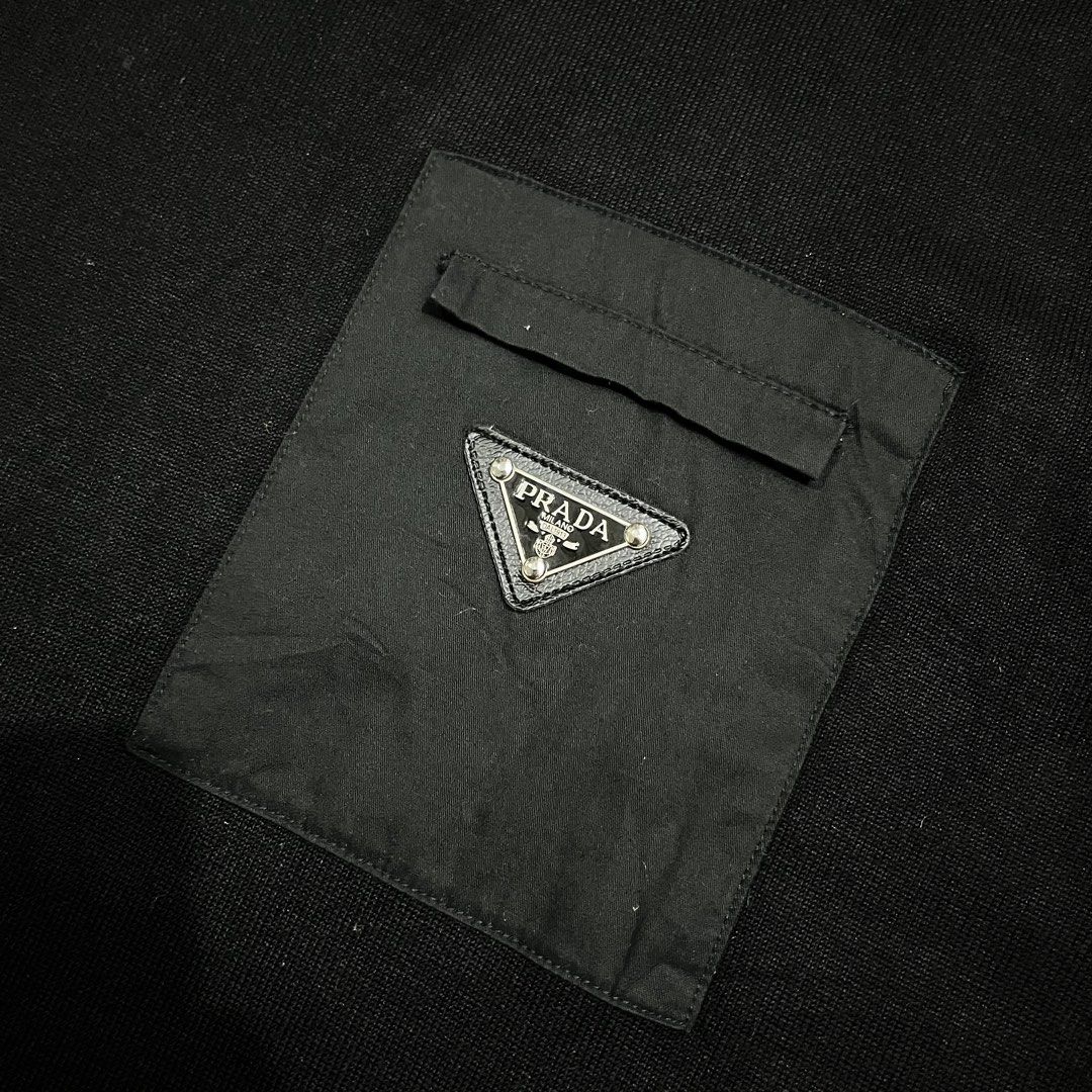 PRADA KNITTED MENS TSHIRT (Category: Luxury Apparel) located in Marikina City. Submitted by arniejane23 (Listing ID 1468882878, Image 3). Description: PRADA KNITTED MENS TSHIRT SIZE MEDIUM TO LARGE DIMENSION width - 21.5 SAFE TO STRECH length - 28 MISSING WASHTAGS NO OTHER MAJOR FLAW EXCELLENT CONDITION!! 📩📩📩.