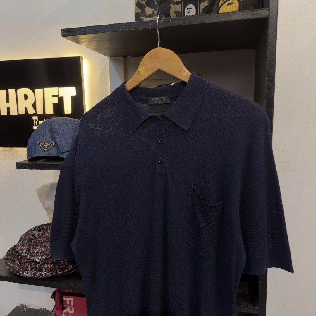 Prada Knitted Polo Shirt (Category: Tshirts & Polo Shirts ) located in Manila. Submitted by jerichomal82553 (Listing ID 1468907602, Image 2). Description: Prada Knitted Polo Shirt 21 by 31.5 Good Condition Complete Tags.