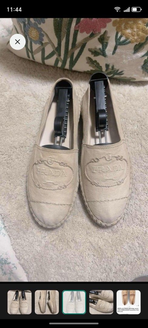 Prada Light beige original espadrille (Category: Flats & Sandals) located in Manila. Submitted by asissaleh35322 (Listing ID 1468885745, Image 1). Description: - Brand: Prada - Style: Canvas Espadrilles Flats - Color: Light Beige - Size: 38 - Details: Embroidered logo on front, classic jute trim along the sole, slip-on design - Condition: Clean inside and out, minimal wear on soles - Inclusions: Shoe trees included - Perfect for: Casual daily wal