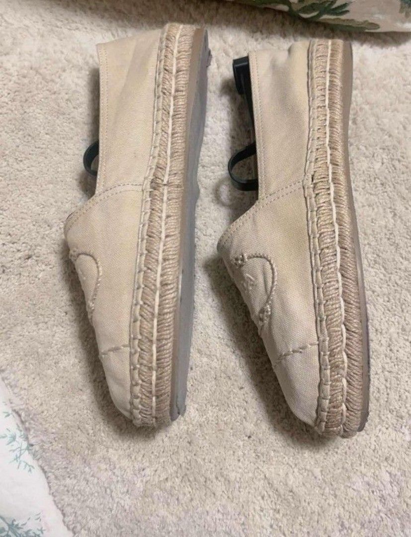 Prada Light beige original espadrille (Category: Flats & Sandals) located in Manila. Submitted by asissaleh35322 (Listing ID 1468885745, Image 2). Description: - Brand: Prada - Style: Canvas Espadrilles Flats - Color: Light Beige - Size: 38 - Details: Embroidered logo on front, classic jute trim along the sole, slip-on design - Condition: Clean inside and out, minimal wear on soles - Inclusions: Shoe trees included - Perfect for: Casual daily wal