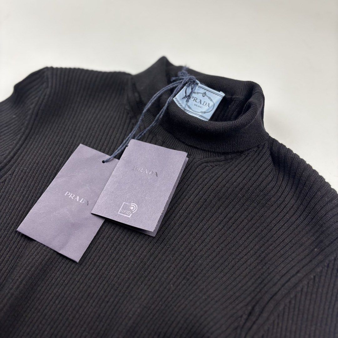 Prada Ribbed Turtleneck (Category: Longsleeves) located in Makati City. Submitted by ragrepository (Listing ID 1468728192, Image 3). Description: Prada Ribbed Turtleneck Tagged as 44 Length- 29” Pit to pit- 15.5” Sleeves- 26.5” Shoulder-13” Condition-NWT Flaw- None .