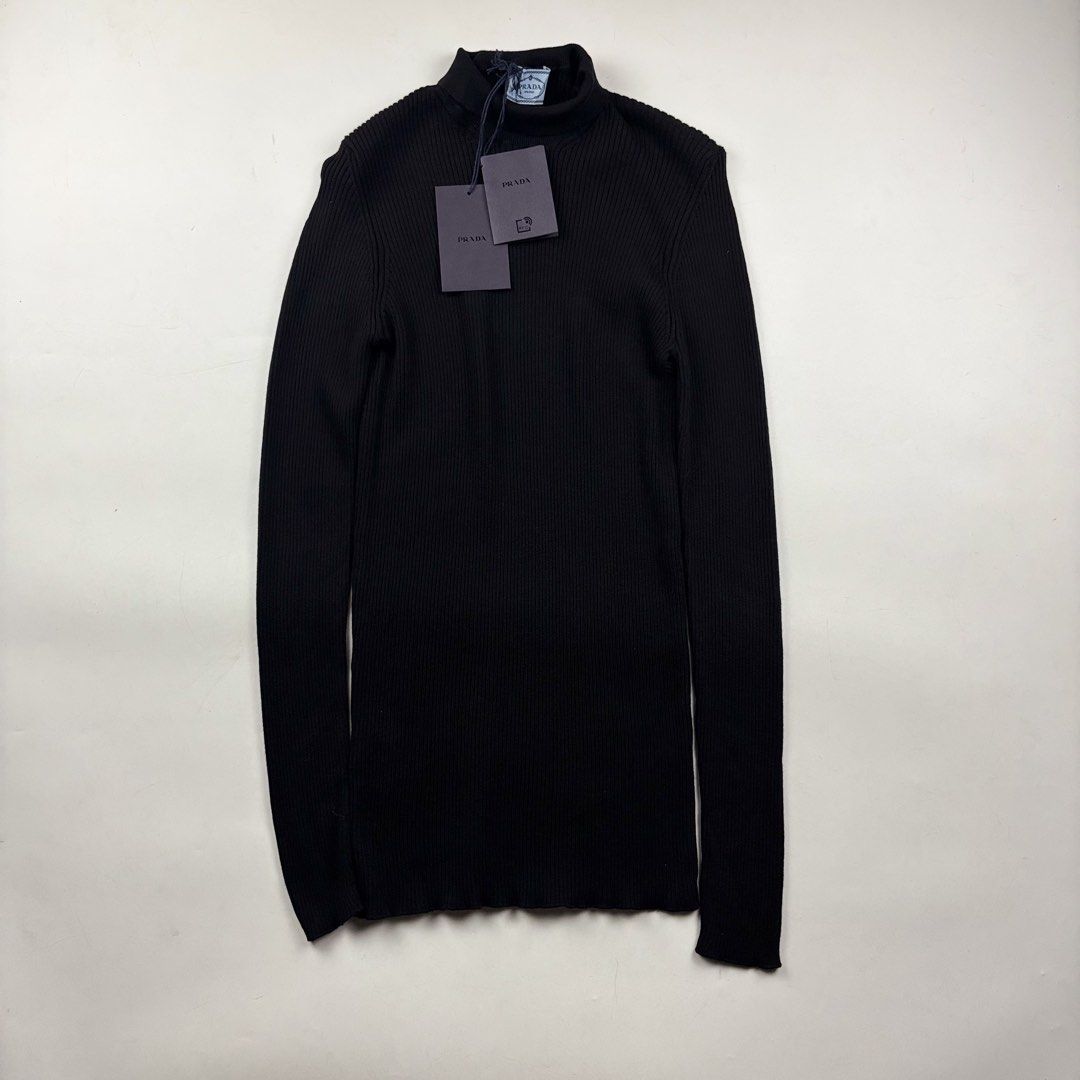 Prada Ribbed Turtleneck (Category: Longsleeves) located in Makati City. Submitted by ragrepository (Listing ID 1468728192, Image 1). Description: Prada Ribbed Turtleneck Tagged as 44 Length- 29” Pit to pit- 15.5” Sleeves- 26.5” Shoulder-13” Condition-NWT Flaw- None .