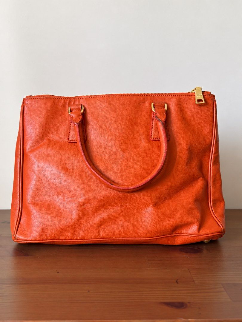 Prada Saffiano (Category: Purses & Pouches) located in Manila. Submitted by myshiekins (Listing ID 1468861339, Image 3). Description: Pr@d@ Saffiano Lux Double Zip Tote No more sling. Rank: B (Good) ₱1,750 ONLY! Japan-sourced. 🇯🇵 DISCLAIMER: We are an independent preloved bag shop and are not affiliated with any brands featured on this page. All trademarks and brand names remain the property of their respective owners..