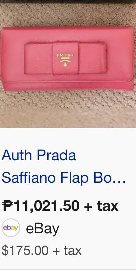 Prada Saffiano Flap Bow Wallet Pink (Category: Luxury Bags & Wallets) located in Manila. Submitted by asissaleh35322 (Listing ID 1468900745, Image 1). Description: - Brand: Prada - Material: Saffiano Leather - Color: Pink - Hardware: Gold-tone with front bow detail - Closure: Snap closure - Interior: Multiple card slots, compartments, and zipper coin pocket - Condition: Clean inside and out, minor wear around edges as shown in photos - Guaranteed