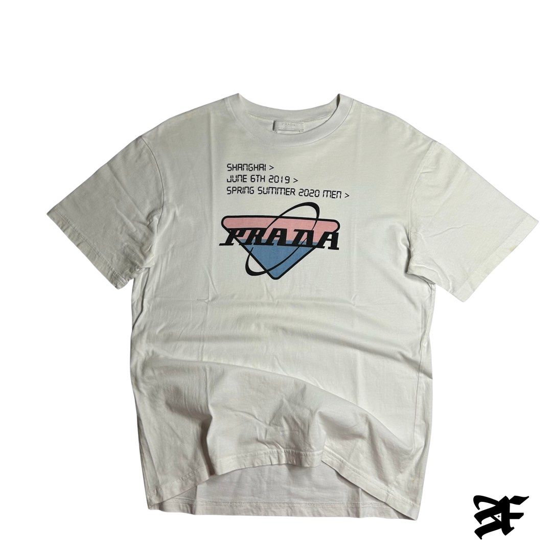Prada Shanghai Exclusive Shirt (Category: Tshirts & Polo Shirts ) located in Antipolo. Submitted by wvyfrnds (Listing ID 1468743501, Image 1). Description: Prada Shanghai Exclusive Shirt Size: S Color: White Dimensions (Inches): Length: 25.5 Width: 19.5 Color Rate: 9/10 Issues - Light stains 395 PLUS SF.