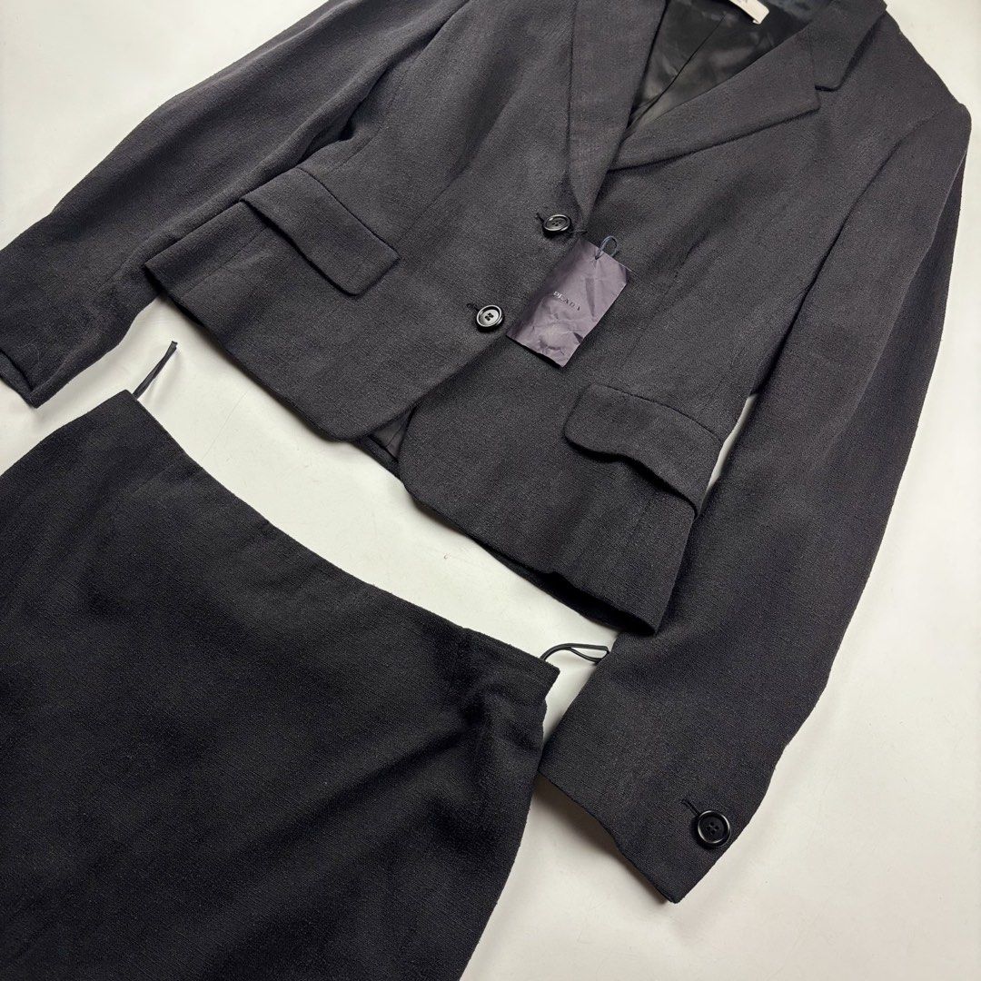 Prada Silk Blend Two Piece Skirt Set (Category: Coats, Jackets and Outerwear) located in Makati City. Submitted by ragrepository (Listing ID 1468727856, Image 2). Description: Prada Two Piece Skirt Set Tagged as 44 Suit Length- 21.5” Pit to pit- 18.5” Sleeves- 23.5” Shoulder-15.5” Condition-NWT Flaw- None —— Skirt Waist- 15” Length- 22” Leg opening- 20.5” Condition- new Flaw- None .