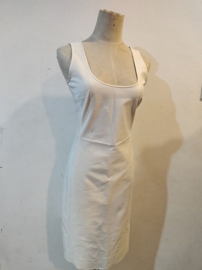 Prada White Dress (Category: Dresses) located in Quezon City. Submitted by dex.colletions (Listing ID 1468883818, Image 1). Description: Prada White Dress authentic issue: small dot infront but washable Decluttering.