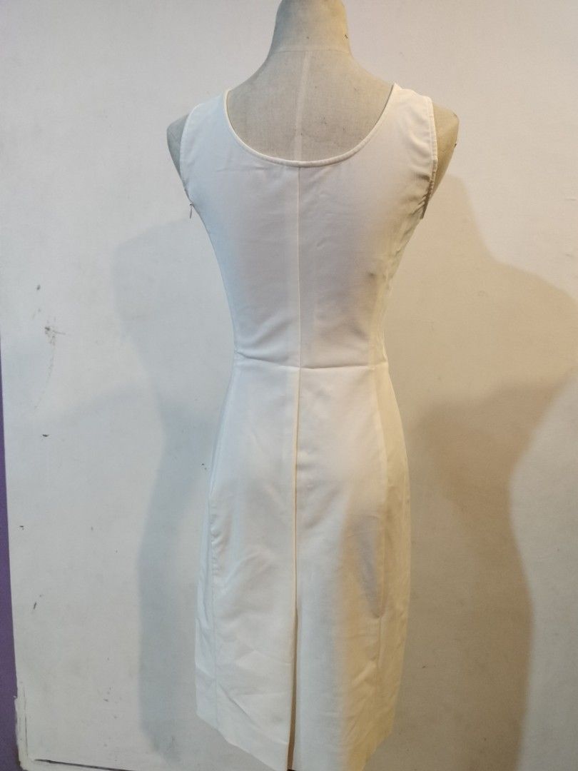 Prada White Dress (Category: Dresses) located in Quezon City. Submitted by dex.colletions (Listing ID 1468883818, Image 2). Description: Prada White Dress authentic issue: small dot infront but washable Decluttering.