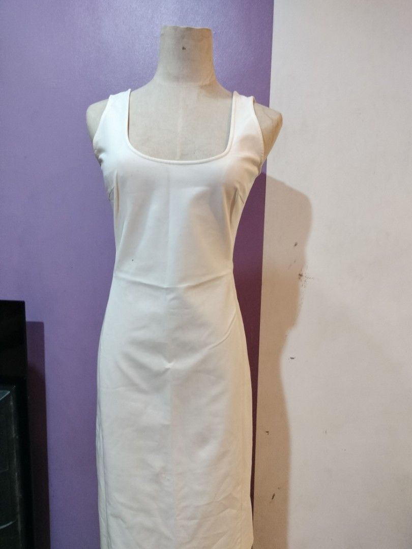 Prada White Dress (Category: Dresses) located in Quezon City. Submitted by dex.colletions (Listing ID 1468883818, Image 3). Description: Prada White Dress authentic issue: small dot infront but washable Decluttering.