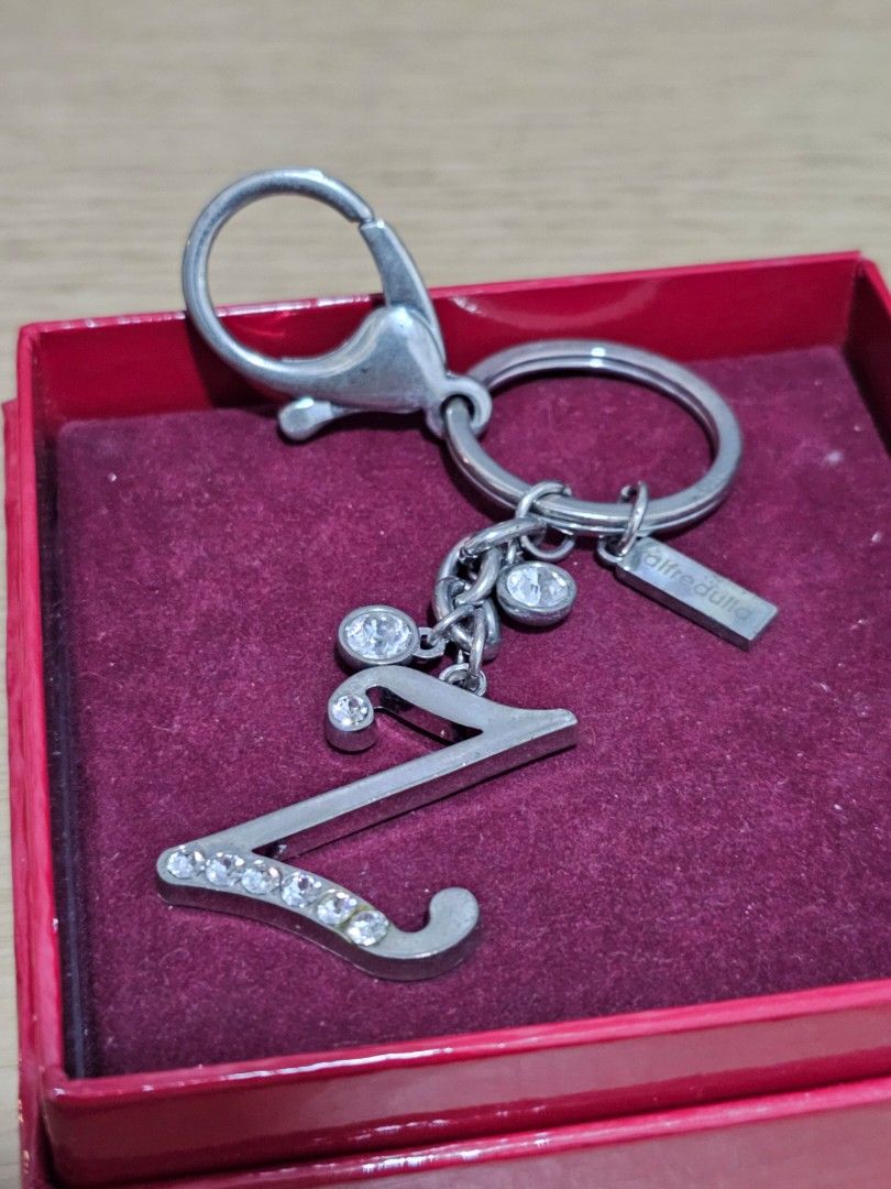 Pre-loved Alfredulla Initial Z Rhinestone Keychain (Category: Other Accessories) located in Caloocan City. Submitted by smart_shoppers_ville (Listing ID 1468713858, Image 1). Description: - Authentic Alfredullq silver-tone keychain featuring letter Z pendant - Adorned with sparkling crystal rhinestones for a touch of elegance - Heavy-duty metal hardware equipped with a secure clasp and split ring - Includes original branded tag stamped Alfredulla