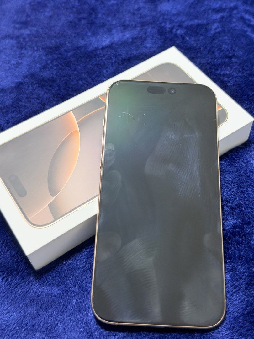 PRELOVED Apple iPhone 16 Pro Max 256gb Desert Titanium (Category: iPhone 16 Series) located in Pasig City. Submitted by akis.onlineshop (Listing ID 1468881365, Image 1). Description: Acquired Nov 2024 in Smart store 🌀Color: Desert Titanium 🌀NO issues except for scratch on screen 🌀software version: 27 🌀 Battery health: 87%, Cycle count: 553 🌀 Inclusion: box, phone, 6 phone cases including pitaka 🌀Open Line 🌀RFS: extra phone 🌀please see ful