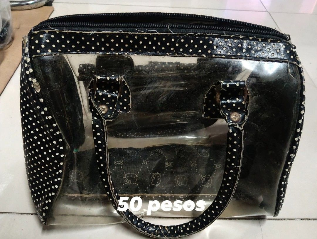 Pre-loved Bags Assorted (Category: Shoulder Bags) located in Antipolo. Submitted by jocyong22 (Listing ID 1468770301, Image 3). Description: - Pre-loved bags available (totes, handbags, clear polka dot bag, turquoise backpack) - Affordable prices ranging from ₱50 to ₱250 - Individual prices and measurements clearly marked on the photos - Location: Masinag, Lower Antipolo - Kindly message us first to check the availability of your chosen piece.