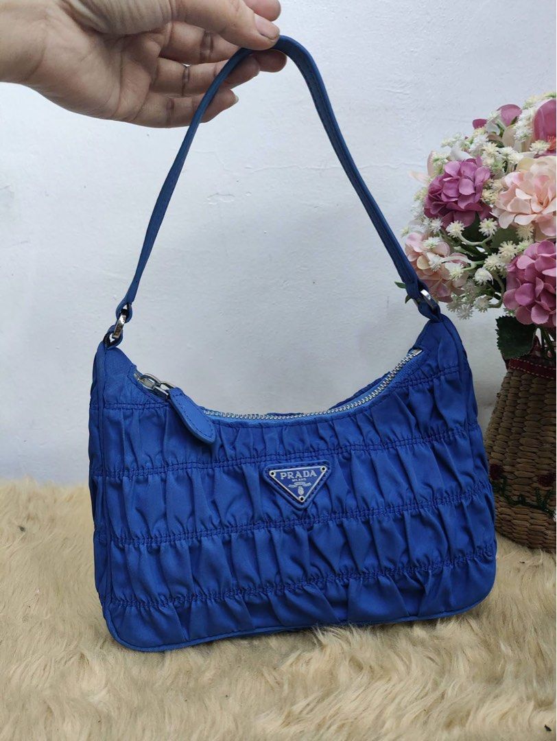 Preloved Prada Tessuto Gaufre Nylon Bag (Category: Shoulder Bags) located in Iloilo. Submitted by preciousgems_collection (Listing ID 1468727680, Image 2). Description: Preloved.