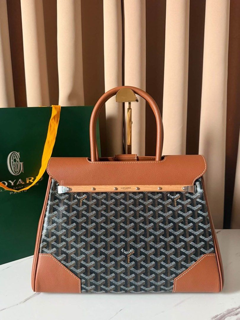 Preloved Saigon Tote Bag (Category: Luxury Bags & Wallets) located in Manila. Submitted by bagsandshoesmanymore (Listing ID 1468805005, Image 2). Description: Preloved Saigon Tote Bag Size 34cm(L) x 25cm(H) x 16cm(W) Linen and cotton Inner side Leather strap and loop fastening system Floating inside pocket Wood beech batten Jewelry Palladium.