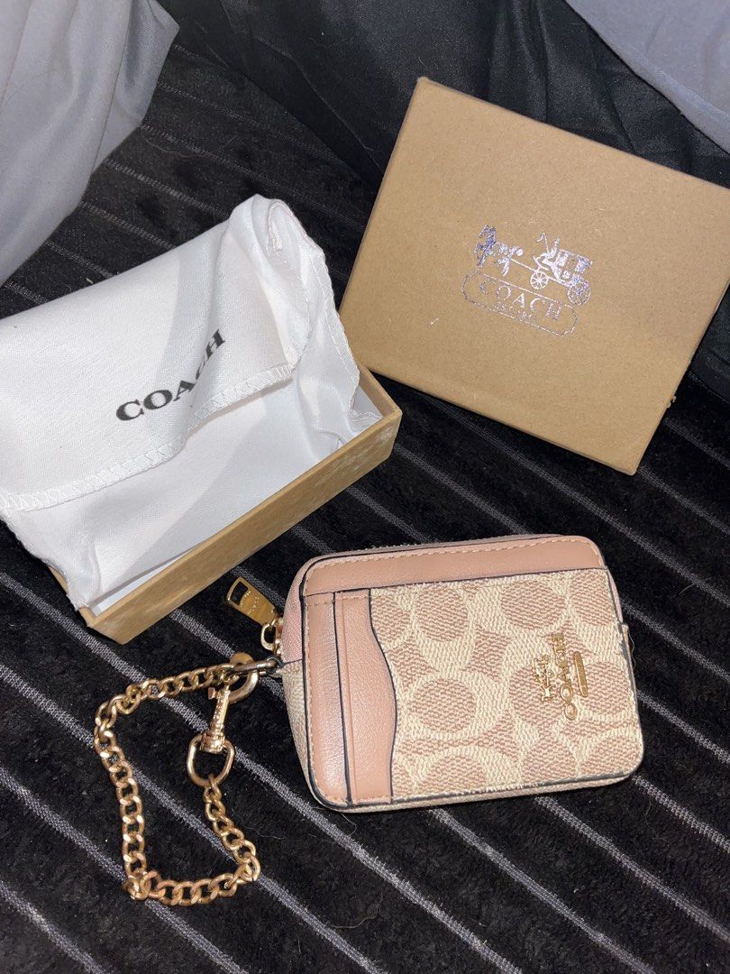 premium coach wallet (Category: Luxury Bags & Wallets) located in Manila. Submitted by luvysa (Listing ID 1468920669, Image 1). Description: i have a new wallet so she needs a new home🫶🏻 twice use .
