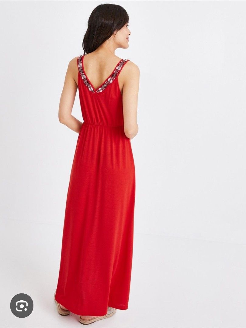 Promod red maxi dress (Category: Dresses) located in Quezon City. Submitted by preloved_by_mariekondo (Listing ID 1468741936, Image 2). Description: Promod Red/Orange Sleeveless Embroidered V-Neck Maxi Dress. It is made from a soft knit blend and features an elasticated high waist, decorative drawstring ties with tassels, and a distinctive embroidered metallic bead and sequin design along the front neckline. Size XS, flattering in person.