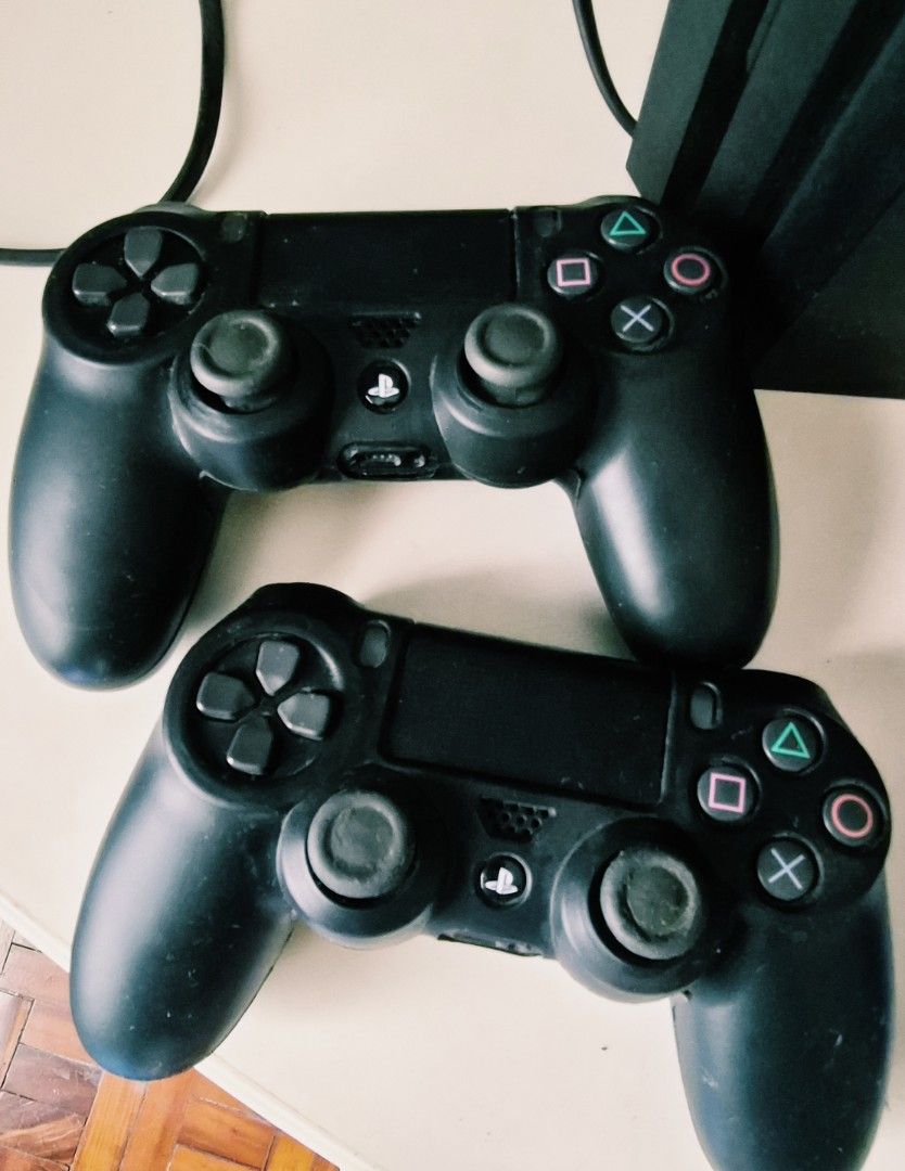 Sony Playstation PS4 Pro 1 TB Bundle (Category: PlayStation) located in Mandaluyong City. Submitted by shopper_on_repeat (Listing ID 1468825348, Image 3). Description: Sony Playstation PS4 Pro, 2 Controller + 6 Games Fully functional and tested, ready to plug and play. 1 TB 2x original DualShock 4 Wireless Controller 6 Original PS4 Games * Diablo III: Reaper of Souls * Dark Souls III * Resident Evil 6 * Assassin’s Creed Odyssey * The Last of Us R
